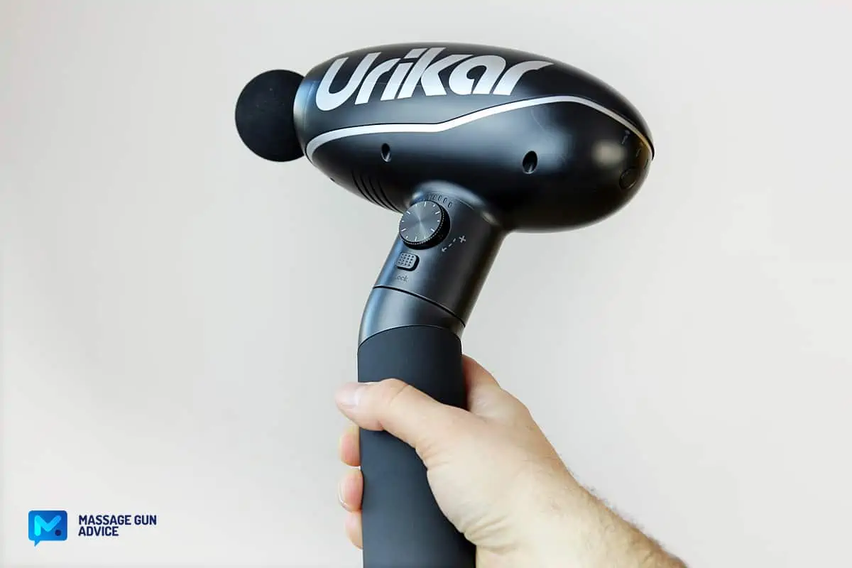 urikar pro 2 massage gun in hand