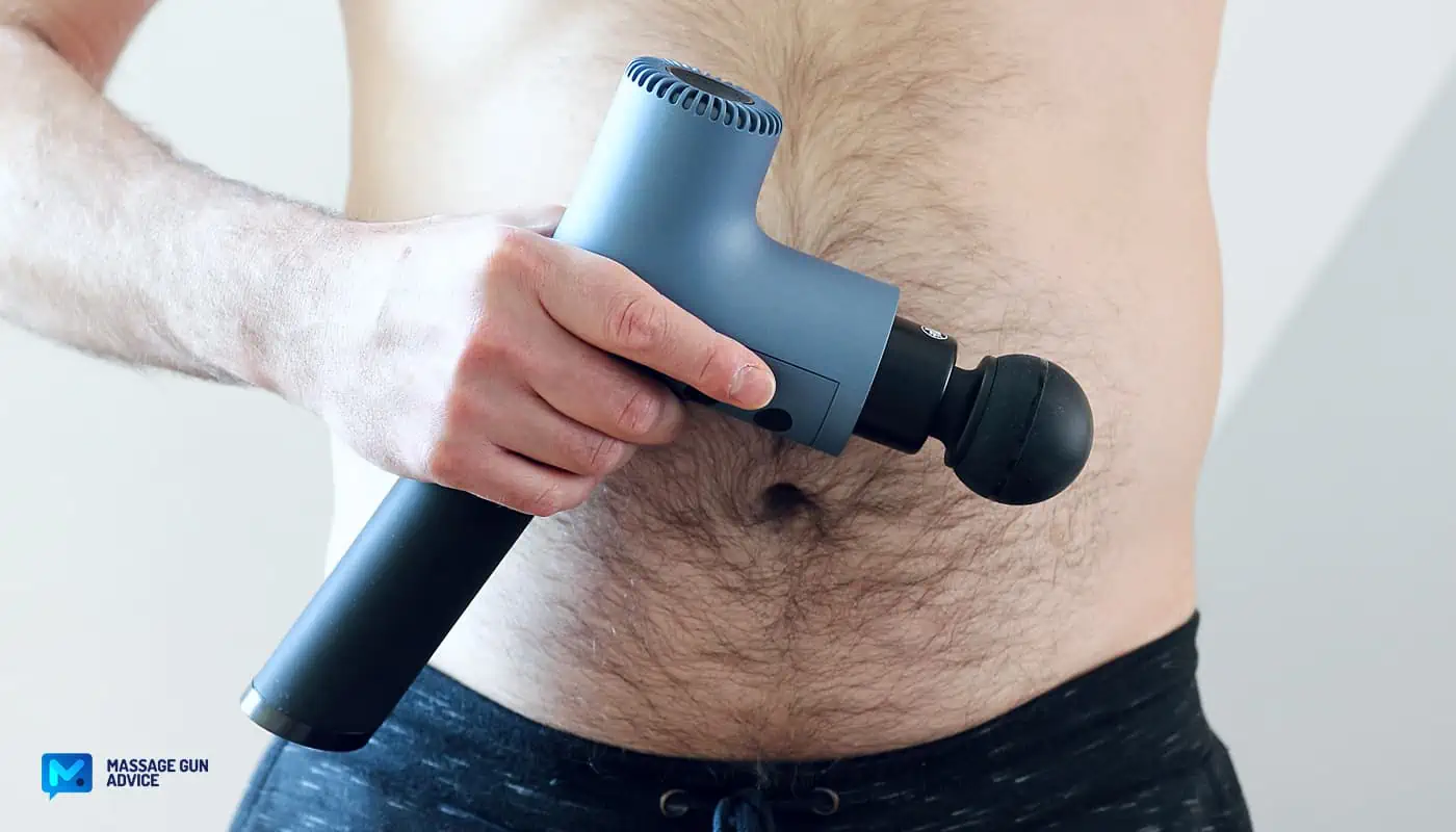 Massage Gun On Stomach? The Dos And Don'ts From The PT